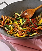 Beef and vegetables in wok