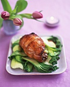 Duck breast roulade on bok choy