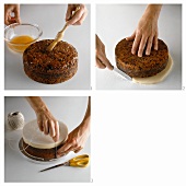 Covering an English fruit cake with marzipan