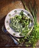 Herb risotto with purple broccoli and goat's cheese