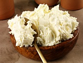 Fresh butter in a wooden bowl