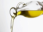 Pouring olive oil out of a carafe