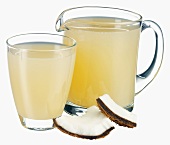 Coconut juice in jug and glass