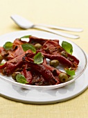 Red pepper salad with olives and basil