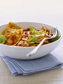 Ravioli with tomatoes and basil