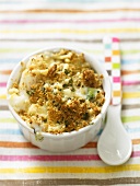 Cod crumble in a small bowl