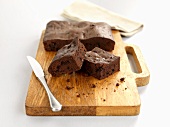Chocolate chip brownies on chopping board