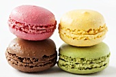Four different coloured macarons