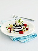 Tower of beetroot and soft cheese with cress
