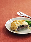 Beef in puff pastry with broccoli