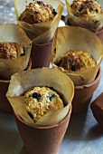 Blueberry muffins baked in terracotta pots
