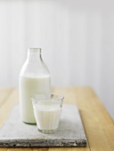 Milk bottle and glass of milk