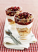 Crunchy muesli with poached pear, yoghurt and pomegranate seeds