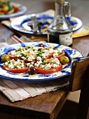 Tomato salad with goats cheese and olives