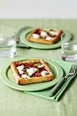Puff pastry tarts with tomatoes, mozzarella and basil