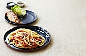 Spaghetti with tomato sauce and rabbit