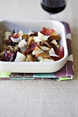Gnocchi with fried ceps and ham