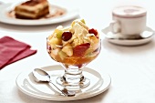 Fruit salad with vanilla ice cream