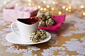 Chocolate truffles with chopped nuts