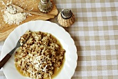 Risotto with meat and grated cheese