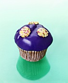 Muffin with purple icing