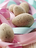 Gulls' eggs among satin ribbons