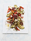 Grilled vegetables and feta cheese on a platter