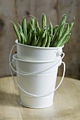 Green beans in stacked buckets