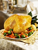 Roast turkey with carrots and Brussels sprouts for Christmas