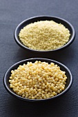 Two different types of couscous in bowls
