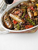 Sausages with lentils, onions, peppers and garlic