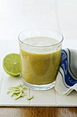 A glass of freshly pressed pear and lime juice