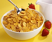A bowl of cornflakes with milk