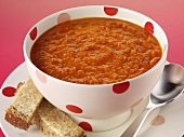 Tomato soup in a spotted bowl