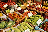 Fruit and vegetables in front of a greengrocer's shop