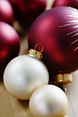Ivory coloured and red Christmas baubles