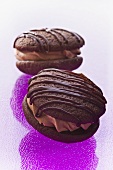 Two chocolate whoopie pies