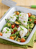 Fish bake with cherry tomatoes, courgettes and green beans