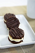 Chocolate biscuits filled with cream
