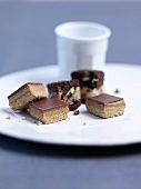 Chocolate and caramel squares and chocolate & pistachio cubes