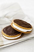 Moon pies (biscuits with a marshmallow filling) with chocolate icing