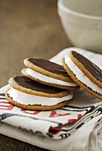 Moon pies (biscuits with a marshmallow filling) with chocolate icing