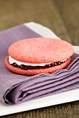 A strawberry moon pie with jam and a marshmallow filling