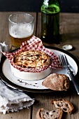 Oven baked camembert with thyme, bread and beer