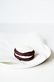 Three Red Velvet Whoopie Pies with Red Icing Drizzles