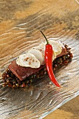 Saddle of rabbit with veal liver and pickled lentils