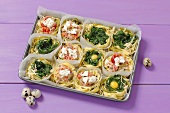Pasta nests filled with spinach, smoked salmon and egg