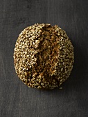 A multi-grain bread roll (see from above)