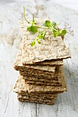 A stack of crispbreads with herbs