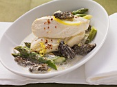 Poached chicken breast with asparagus and morel mushrooms with lemon sauce